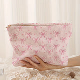 Vvsha Minimally designed pink bow pattern printed corduroy zipper makeup bag, lightweight and multifunctional cosmetic storage bag