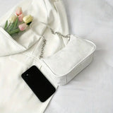 Vvsha This white elegant and gentle chain underarm bag for women is foreign-style, simple and a small square bag. It's a fashionable a