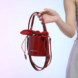 Vvsha Mini Exquisite Wine Red Glossy Lacquer Surface Crossbody Bag 2024 New Bow Drawstring Underarm Bags High Street Lipstick Handbag